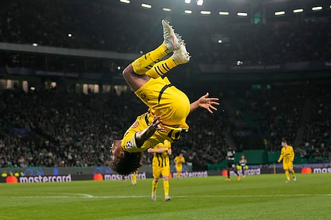 Champions League playoff first leg: Dortmund's Karim Adeyemi celebrates after scoring his side's third goal