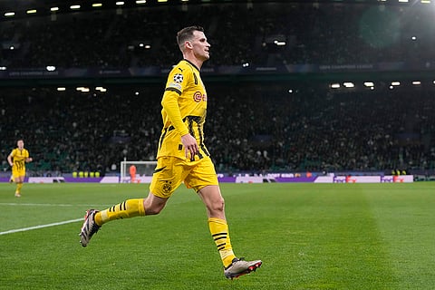 Champions League playoff first leg: Dortmund's Pascal Gross celebrates after scoring his side's second goal