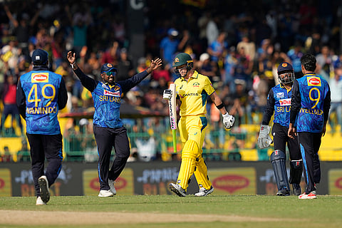 SL vs AUS 1st ODI: Sri Lanka's team members celebrate the wicket of Australia's Nathan Ellis