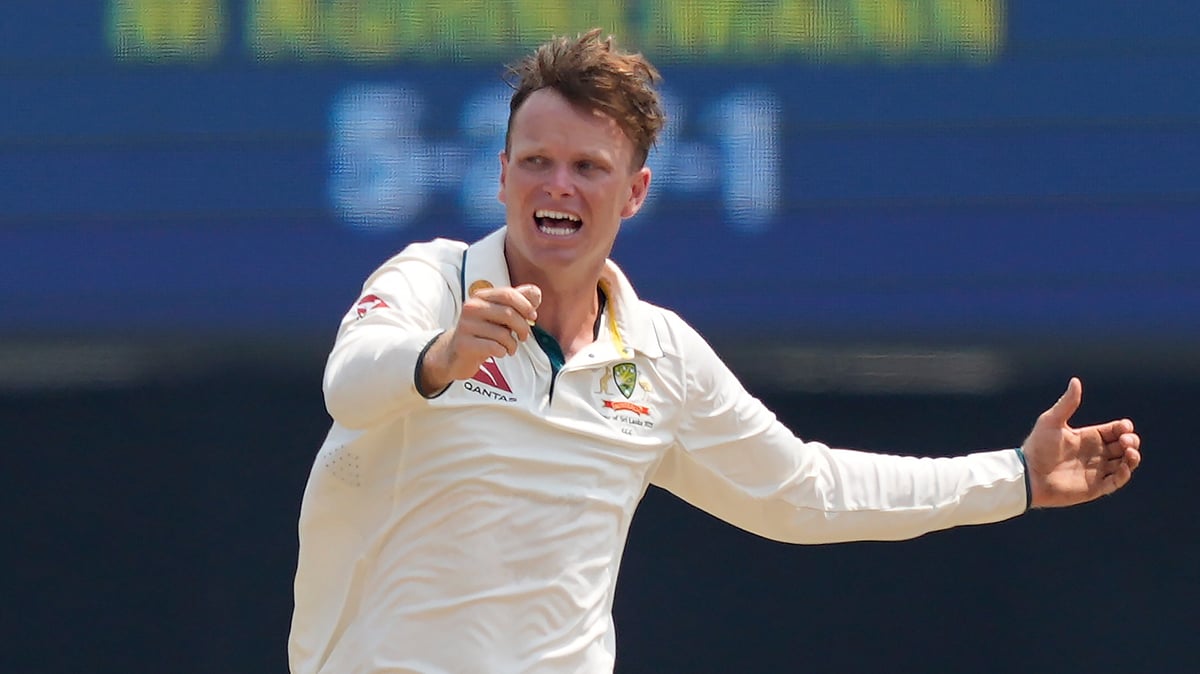 (AP Photo/Eranga Jayawardena) : Australia's Matthew Kuhnemann celebrates the wicket of Sri Lanka's Dimuth Karunaratne during day three of the second test cricket match between Sri Lanka and Australia in Galle, Sri Lanka, Saturday, Feb. 8, 2025. 