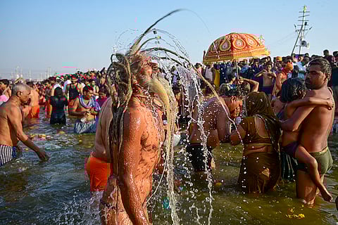 Maha Kumbh 2025, Maghi Purnima Snan: A sadhu shakes off water droplets from his hair