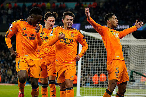 Champions League playoff first leg: Real Madrid's Jude Bellingham celebrates with teammates after scoring his sides third goal