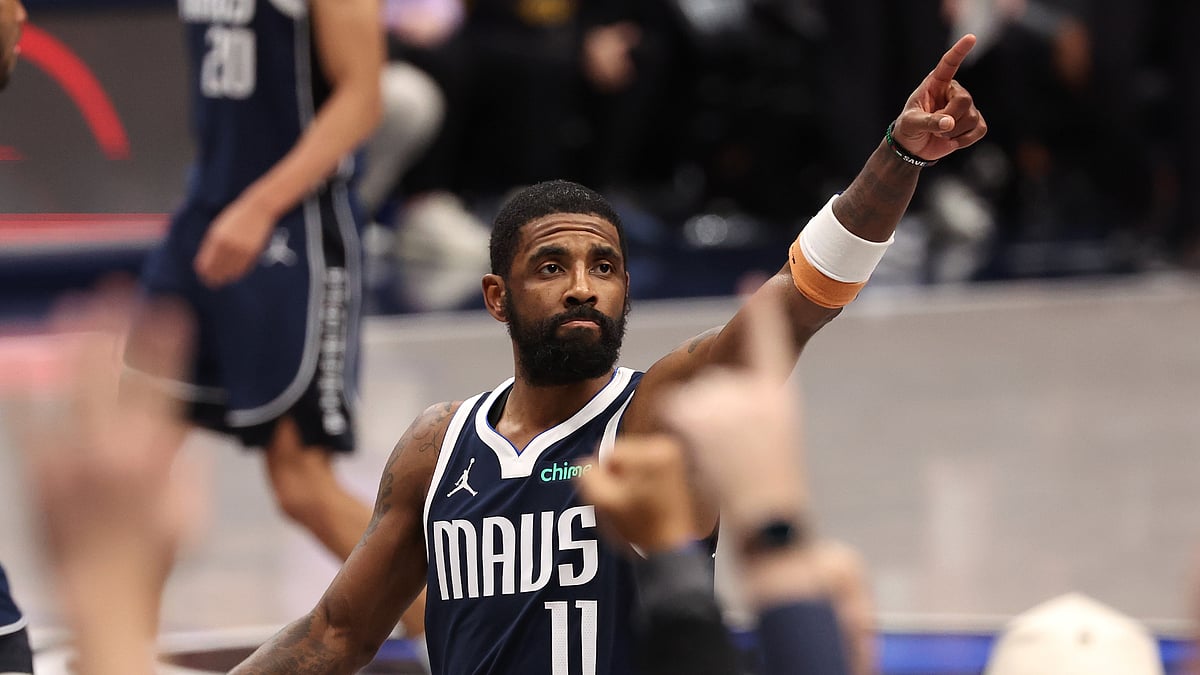 Kyrie Irving celebrates the Dallas Mavericks' win over the Golden State Warriors.