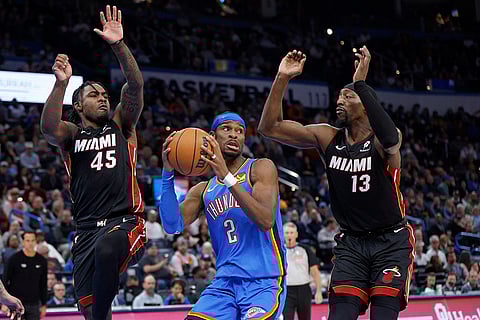 NBA 2024-25: Thunder guard Shai Gilgeous-Alexander (2) looks to pass the ball