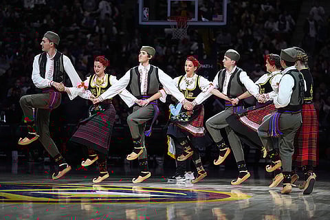 NBA 2024-25: Serbian dancers from the group Kolorado perform during halftime