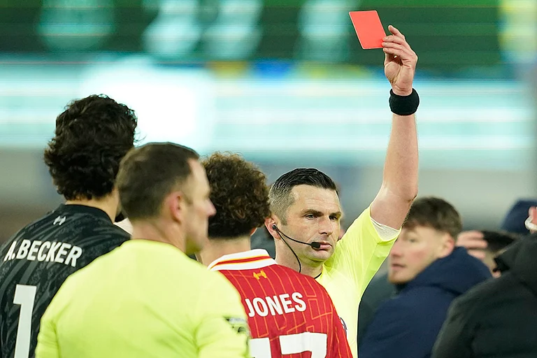 EPL 2024-25: Referee Michael Oliver shows a red card to Liverpool's Curtis Jones - | Photo: AP/Dave Thompson