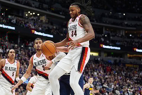 NBA 2024-25: Trail Blazers forward Jabari Walker pulls in a rebound