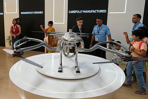 Aero India 2025: An unmanned aerial vehicle is displayed at a pavilion