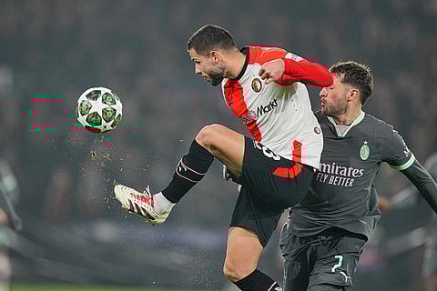 Champions League playoff first leg: Feyenoord's David Hancko kicks the ball next to AC Milan's Santiago Gimenez
