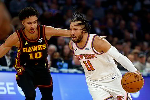 NBA 2024-25: Hawks forward Zaccharie Risacher (10) defends against Knicks guard Jalen Brunson