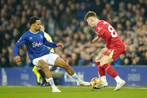 EPL 2024-25: Everton's Iliman Ndiaye challenges for the ball with Liverpool's Conor Bradley