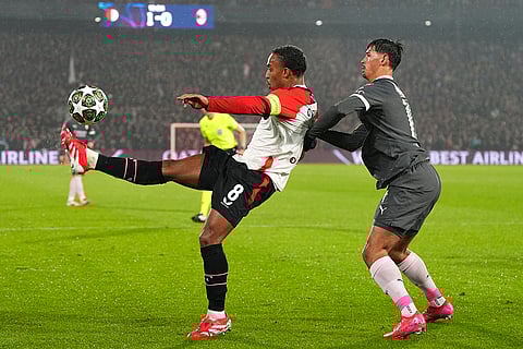Champions League playoff first leg: Feyenoord's Quinten Timber kicks the ball next to AC Milan's Tijjani Reijnders