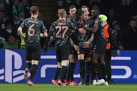 Champions League playoff first leg: Bayern's Michael Olise celebrates with team mates after scoring his side's opening goal