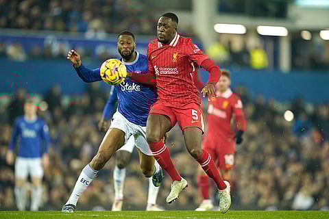 EPL 2024-25: Everton's Beto challenges for the ball with Liverpool's Ibrahima Konate