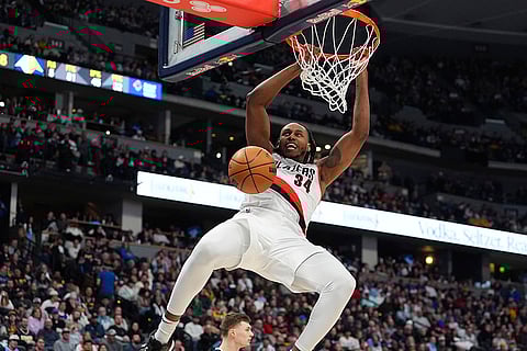 NBA 2024-25: Trail Blazers forward Jabari Walker dunks the ball