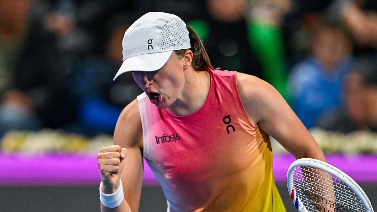 Iga Swiatek celebrates her win over Elena Rybakina at the Qatar Open - null