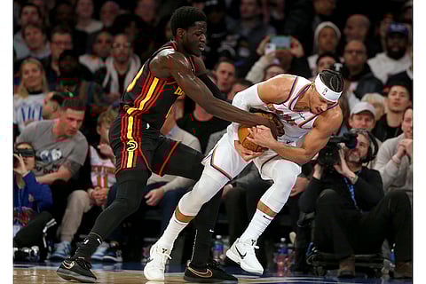 NBA 2024-25: Hawks forward Mouhamed Gueye and Knicks guard Josh Hart battle for the ball