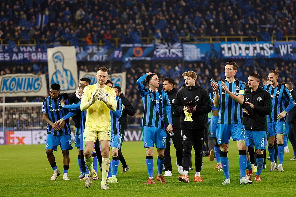 | Photo: AP/Geert Vanden Wijngaert : Champions League playoff first leg: Brugge's players celebrate their win against Atalanta