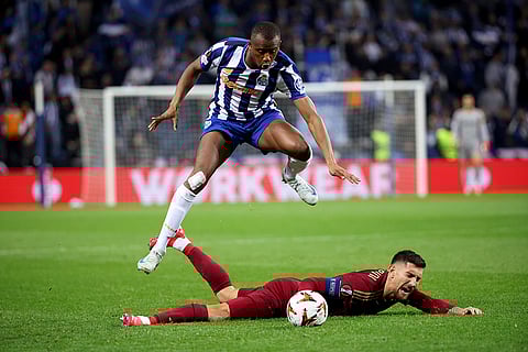 Europa League playoff 1st Leg: Porto's Tiago Djalo leaps over Roma's Lorenzo Pellegrini