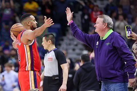 NBA 2024-25: Pelicans guard CJ McCollum (3) is congratulated by a fan