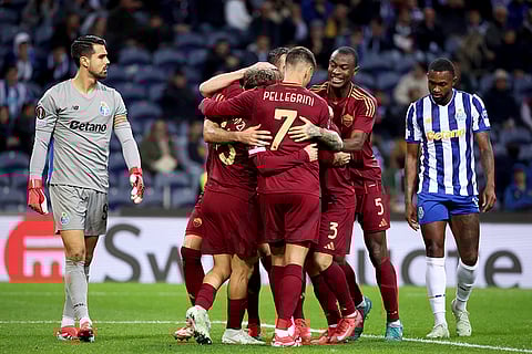 Europa League playoff 1st Leg: Roma players celebrate after scoring the opening goal