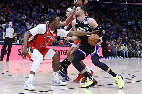 NBA 2024-25: Pelicans guard Javonte Green (4) strips the ball from Kings guard Zach LaVine