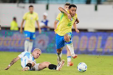 U-20 South American Championship: Brazil's Pedro Silva dribbles past Argentina's Franco Mastantuono