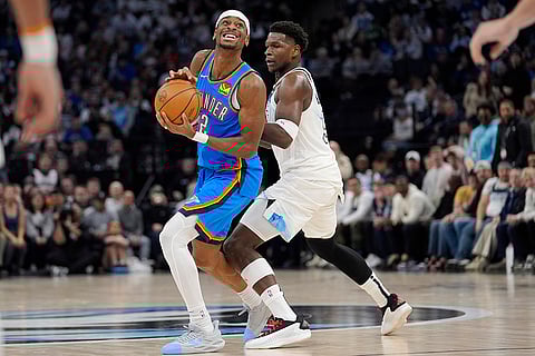 NBA 2024-25: Thunder guard Shai Gilgeous-Alexander (2) works toward the basket