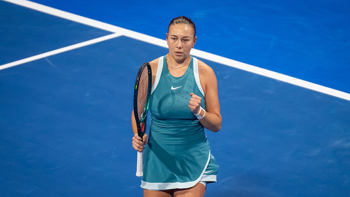 Amanda Anisimova celebrates her win over Ekaterina Alexandrova