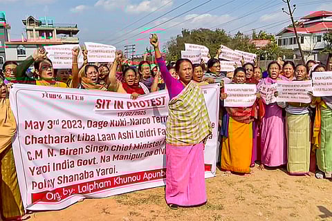 Women raise slogans during their protest in Manipur