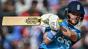 England's Ben Duckett plays a shot