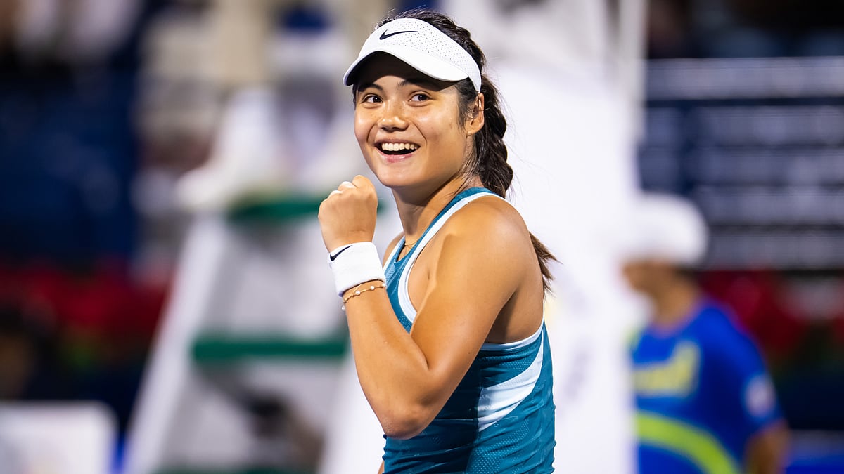 Emma Raducanu celebrates after winning match point