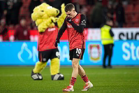 Bundesliga 2024-25: Leverkusen's Florian Wirtz reacts disappointed after the match