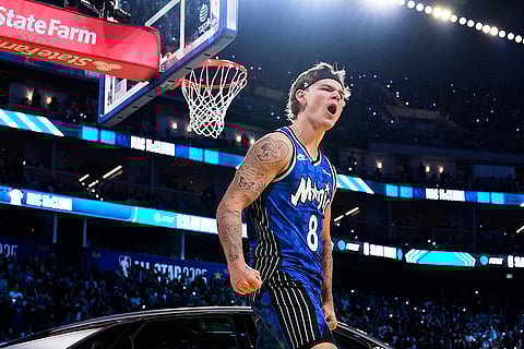Slam Dunk Contest: Osceola Magic guard Mac McClung celebrates after dunking