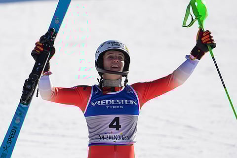 Austria Ski Worlds: Camille Rast celebrates winning the gold medal
