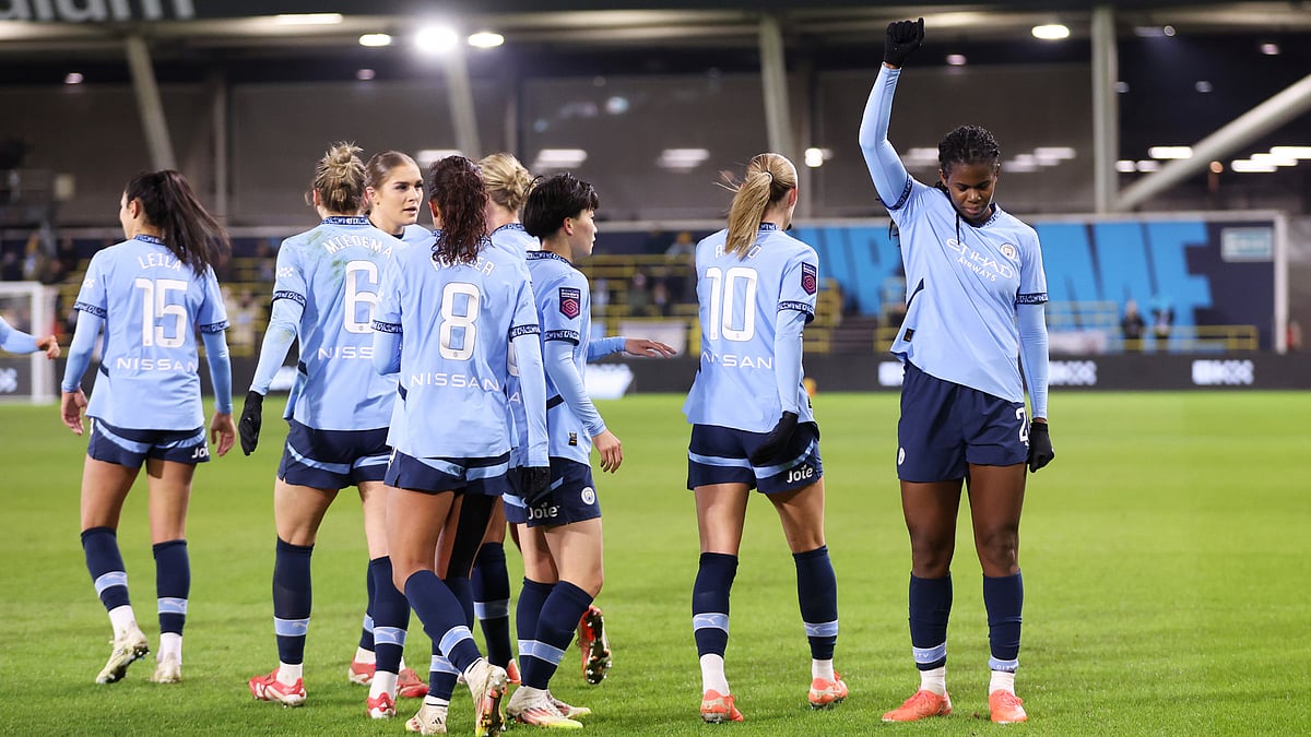 Khadija Shaw celebrates her first-half double against Liverpool - null