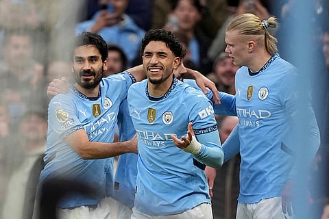 Premier League 2024-25: Manchester City's Omar Marmoush celebrates with team-mates after scoring their side's third goal 