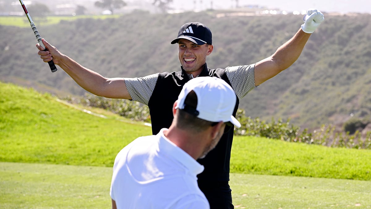 Ludvig Aberg celebrates after making a hole-in-one.