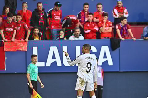 La Liga  2024-25: Real Madrid's Kylian Mbappe celebrates in front of Osasuna fans
