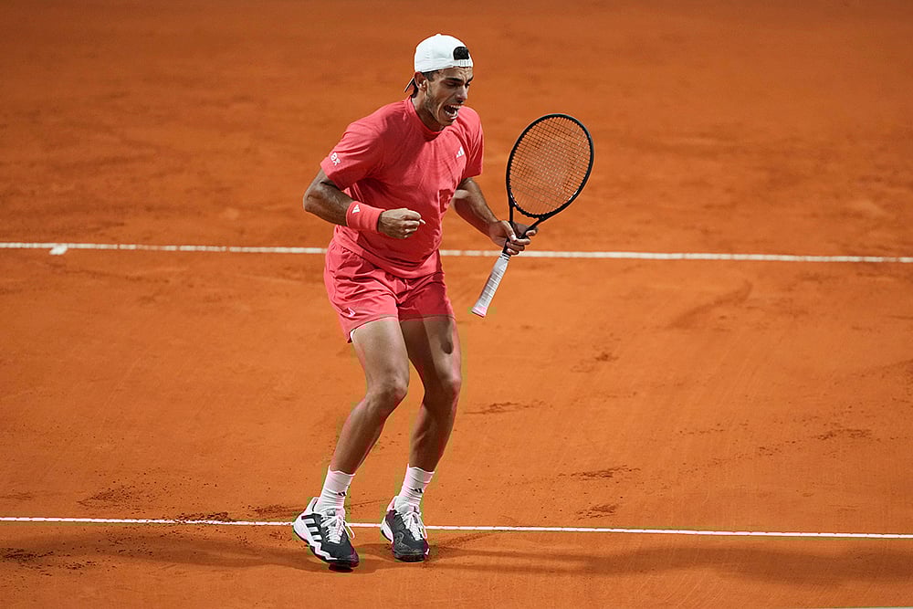| Photo: AP/Gustavo Garello : Argentina Open ATP quarterfinals: Francisco Cerundolo celebrates a point against Alexander Zverev