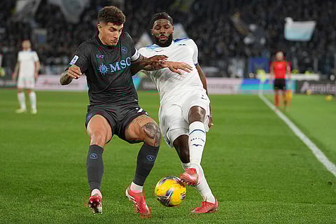 Serie A 2024-25: Napoli's Giovanni Di Lorenzo and Lazio's Nuno Tavares compete for the ball