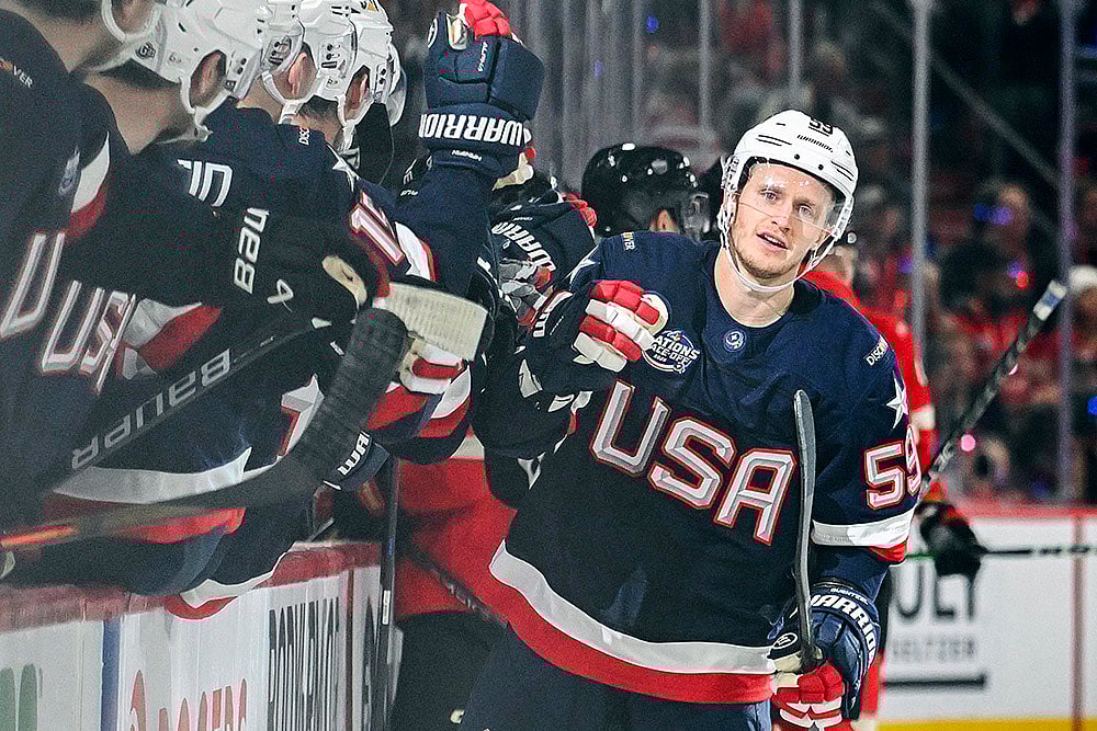 | Photo: Graham Hughes//The Canadian Press via AP : 4 Nations Hockey USA vs Canada: United States' Jake Guentzel celebrates with the bench after scoring