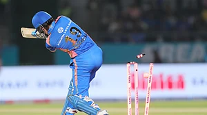 X/WPLT20 : Bails light up during a Women's Premier League match.