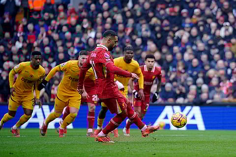 EPL 2024-25: Liverpool's Mohamed Salah shoots to score from the penalty spot