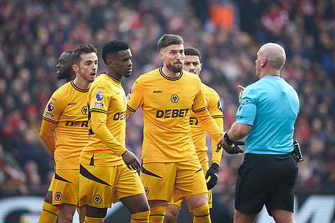 EPL 2024-25: Wolves' players argue with referee Simon Hooper