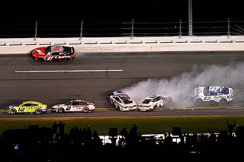 NASCAR Daytona 500: Denny Hamlin (11) and Cody Ware (51) collide between Turns 3 and 4
