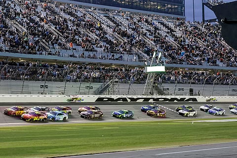 NASCAR Daytona 500:  William Byron (24) and Joey Logano (22) lead the field to restart race