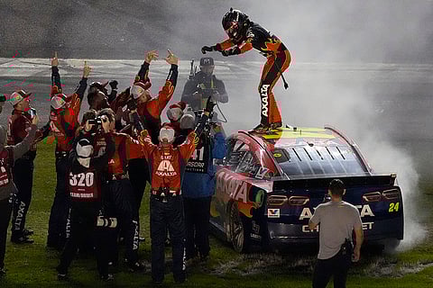 NASCAR Daytona 500: William Byron, on car, celebrates with his pit crew