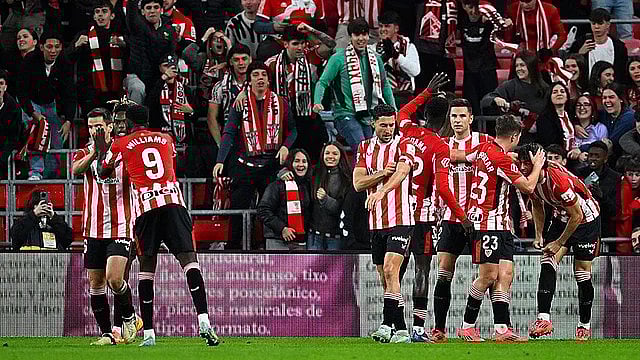 AP : Athletic Bilbao celebrate a goal against Real Madrid in La Liga.