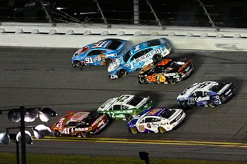 NASCAR Daytona 500: Helio Castroneves (91), Ross Chastain (1) and Martin Truex Jr. (56) get involved in a multi-car collision